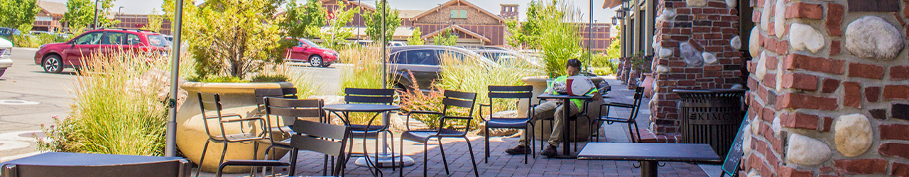 Patio area with tables and chairs at a local business