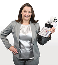 Vicki Van Buren holding a ten-key calculator