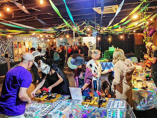 people shopping at a decorated craft fair